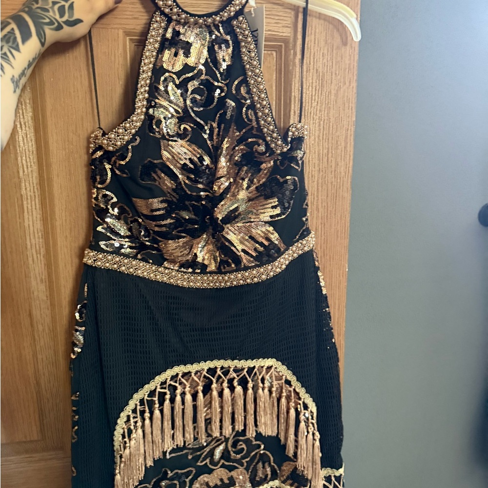 Elegant Black and Gold Embellished Dress